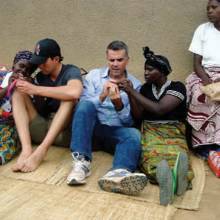 Currently focusing on advocacy for the poor, Steve May learns to weave baskets in a Rwandan “Reconciliation Village.” phm0312pf 2 md