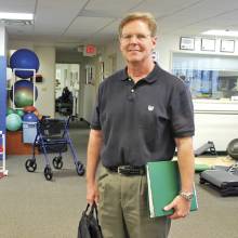 Brain injury survivor Kelly Sample returned to managing his restaurants after graduating from Barrow’s neurorehab program. phm0412 brain4 md