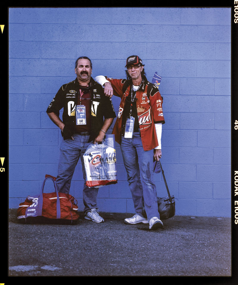 race fans John Campbell, left, and Darryl Lavoy, both truck drivers from Elephant Butte, New Mexico
