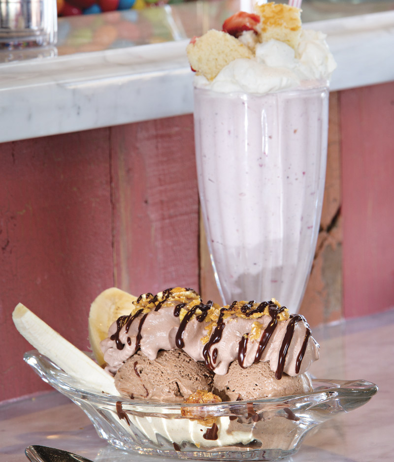 Death by Chocolate banana split and a strawberry milkshake