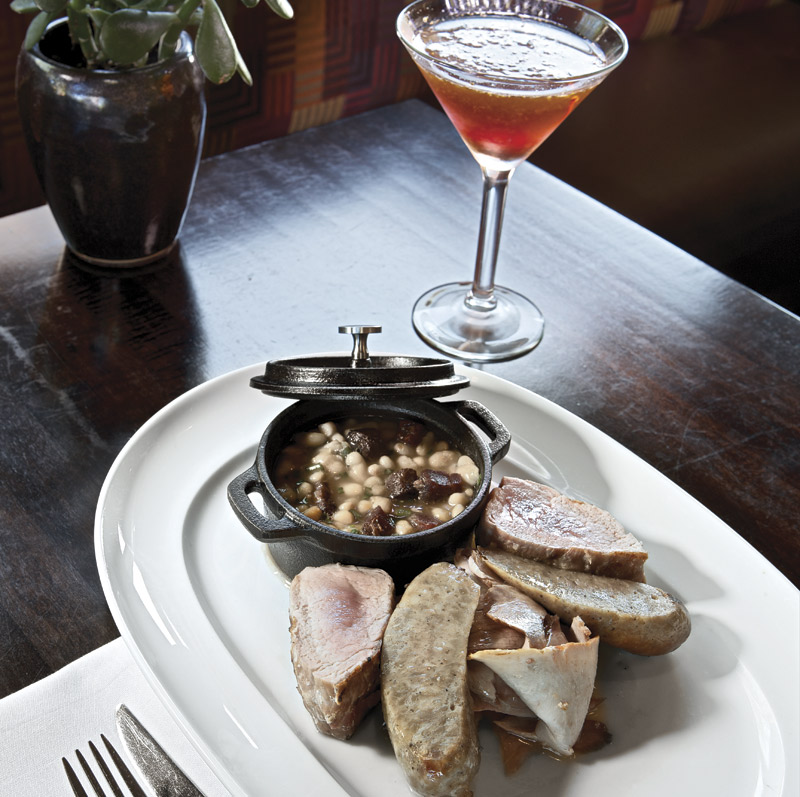 Swine-grilled pork loin, smoked hock, and sausage &ndash; with a Fig Manhattan 