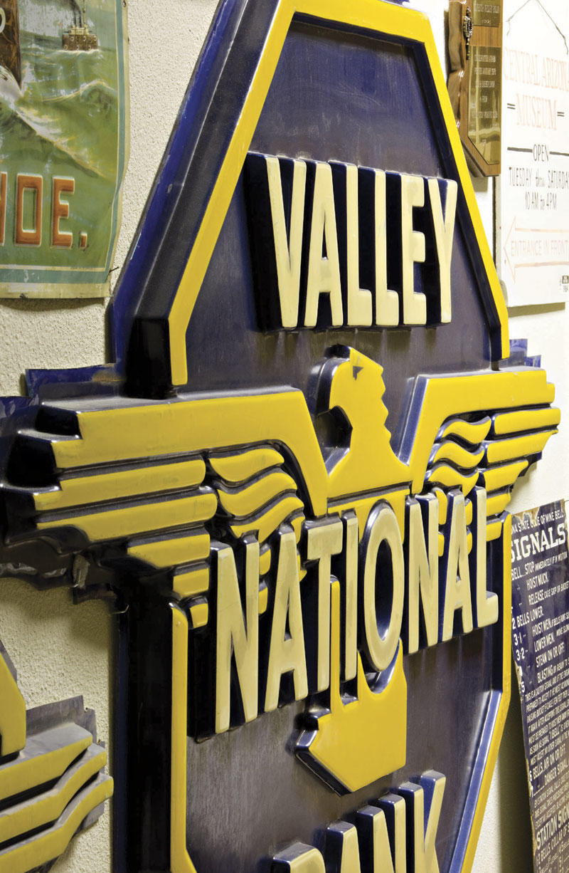 An old sign from Valley National Bank sits in the storage area at the Arizona Historical Society Museum in Tempe. The sign, which registrar Ashley Smith says appears to be made of a plexi plastic, was manufactured around 1985, and came to AZHS in 2003 through a former bank employee who donated a  collection of VNB objects to the AZHS Tucson branch