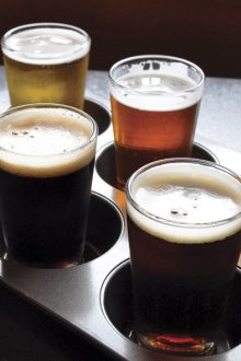 Photo By Nicole Roegner, A flight of craft beer at Lumberyard Brewing Company