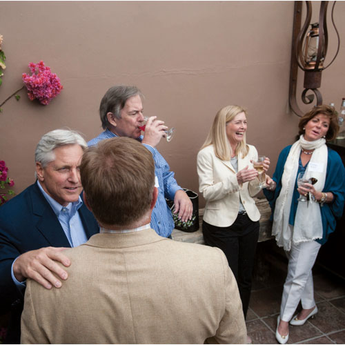 DuVal connects with Paradise Valley Mayor Scott LeMarr. Christa Severns holds court in the background. PHMFRED04
