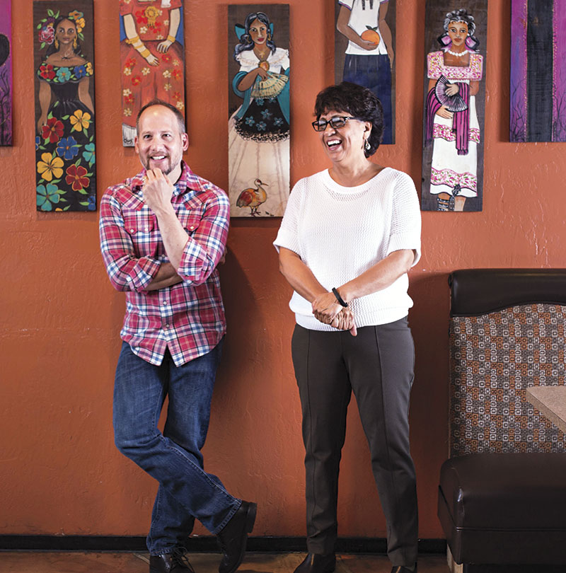 photo by Blake Bonillas; Otro owner Doug Robson and  Comedor Guadalajara owner Teresa Sanchez-Hiller  take a break from their cocinas.