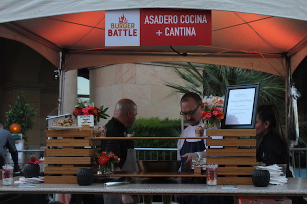 Asadero&rsquo;s Chef Don Molinich (left) and his team work to prepare their wagyu beef sliders before the gates open.