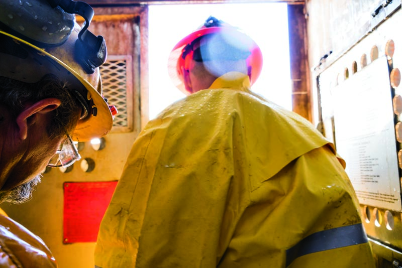 Seppala and Tobin ride the elevator back to the surface. Photo by Mark Lipczynski