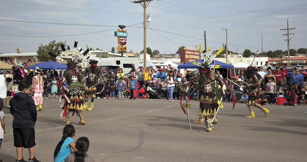 Zuni dancers perform powwow dances at the 71st annual Navajo Nation Fair parade