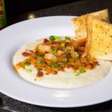 Recipe Friday: The Shrimp and Grits from Voodoo Daddy's Steam Kitchen