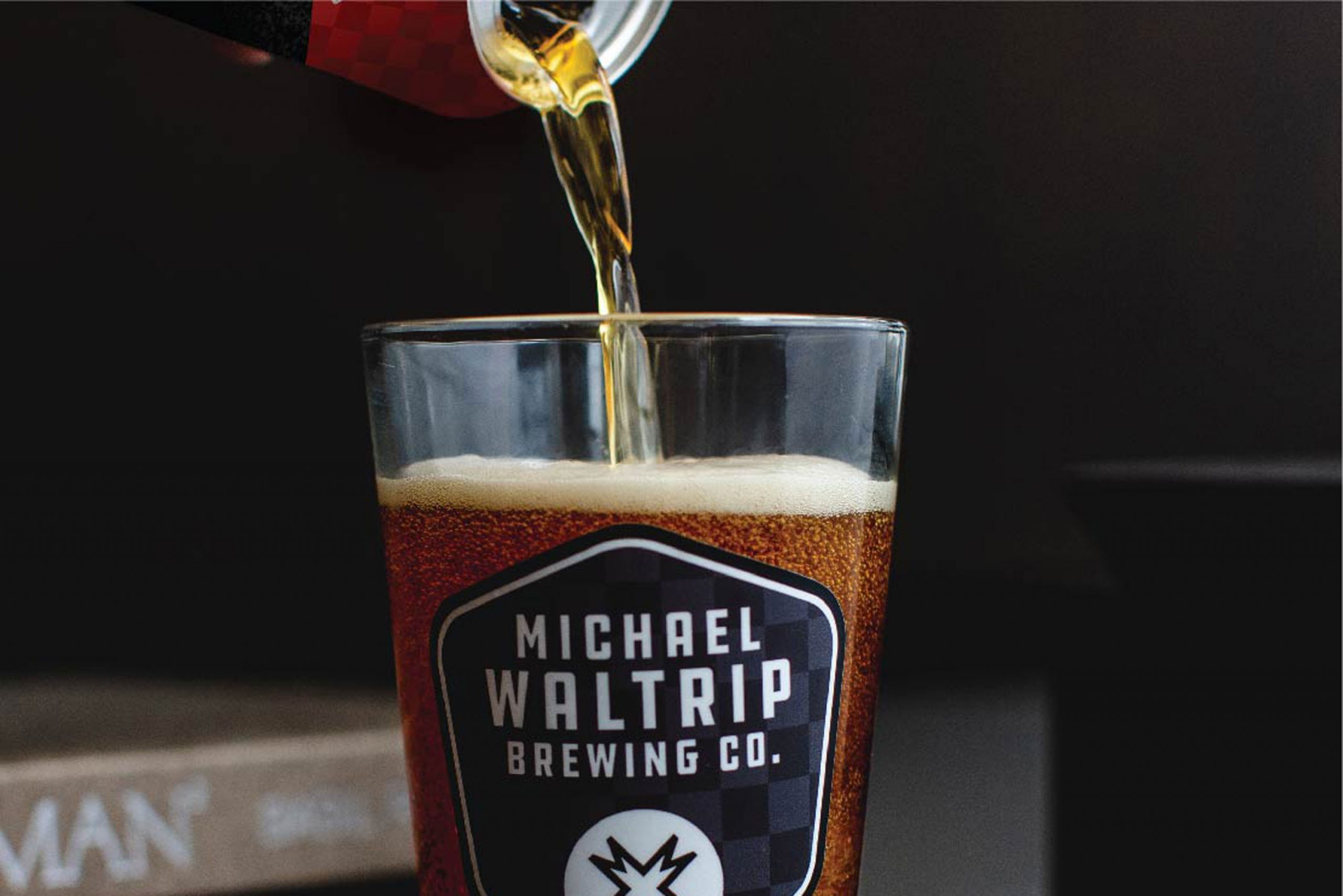Checkered Past Coconut IPA from Michael Waltrip Brewing Company