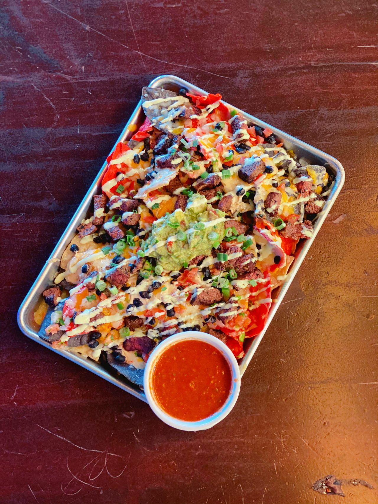 https://www.phoenixmag.com/wp-content/uploads/2021/01/Bevvy-Macho-Nachos-2-1280x1707.jpeg