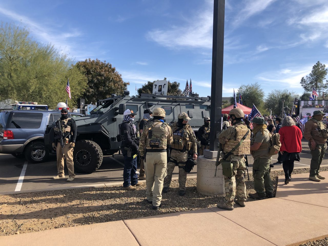 https://www.phoenixmag.com/wp-content/uploads/2021/01/Militia-gathered-by-Pit-Bull-VX-van-1280x960.jpg