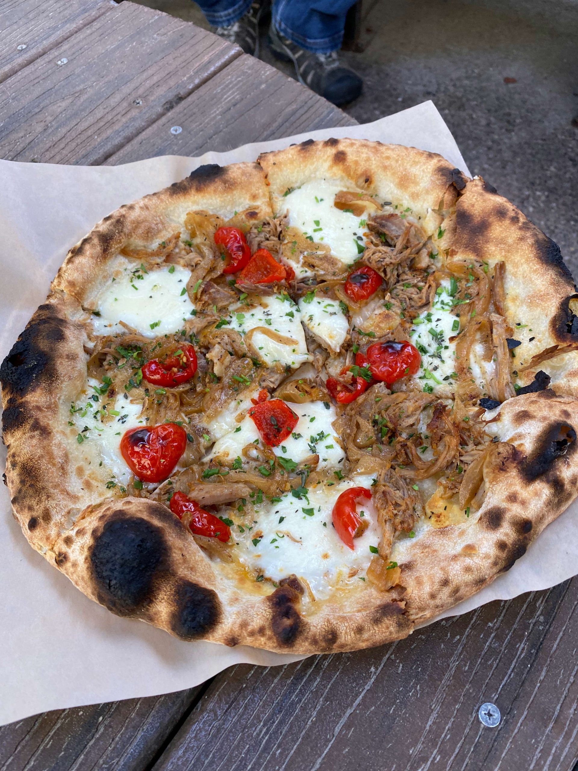 Pizza with pulled pork, peddadew peppers, fresh mozzarella and herbs at Pedal Haus Brewery in Tempe. Photo credit Matthew Johnson.