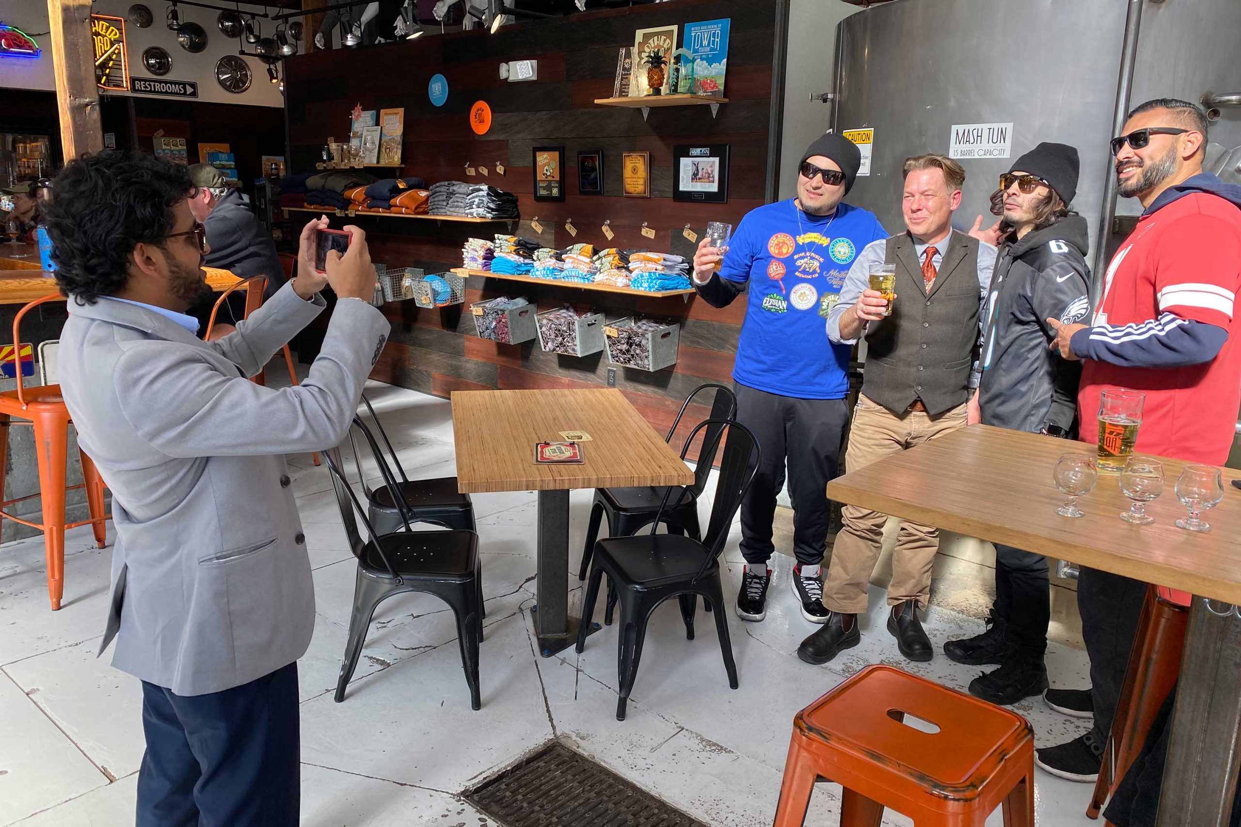 Mother Road founder Michael Marquess poses for a picture with fans
