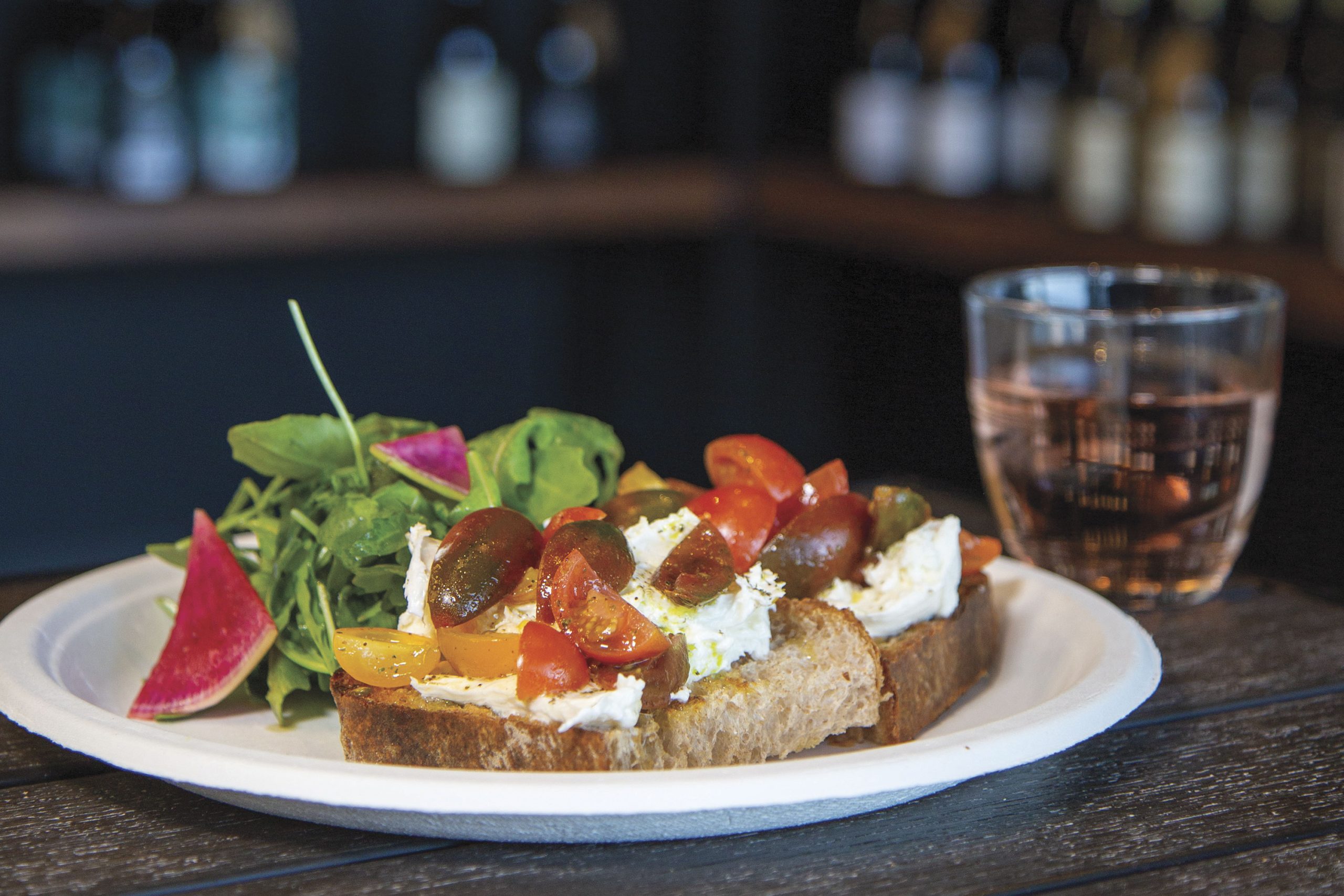 Bruschetta with stracciatella, tomatoes and basil oil Bruschetta with stracciatella, tomatoes and basil oil