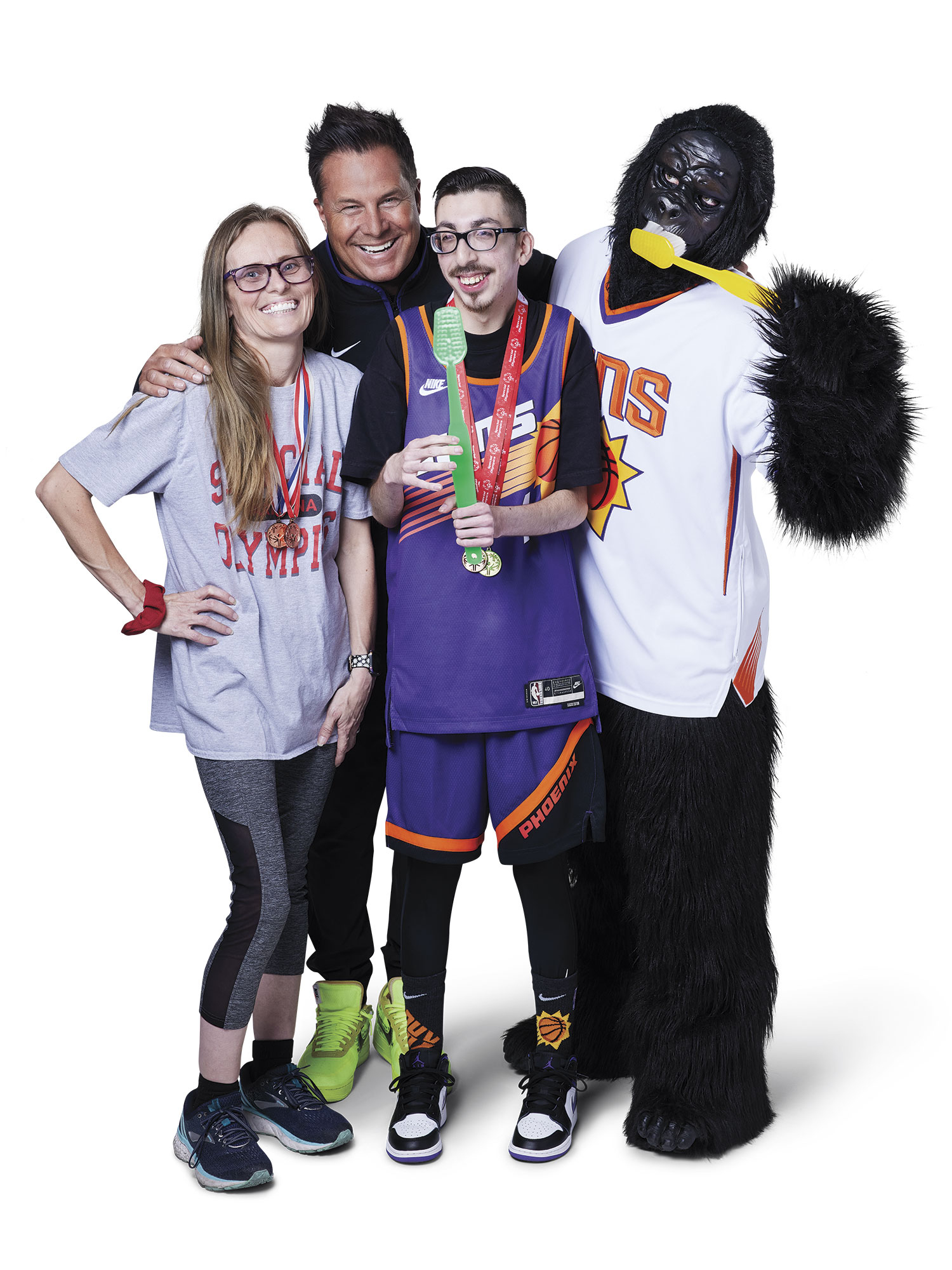 “Dr. B” with Special Olympians Amber Nielsen and Adam Garcia Hernandez and Phoenix Suns mascot Go the Gorilla; Photography by Steve Craft “Dr. B” with Special Olympians Amber Nielsen and Adam Garcia Hernandez and Phoenix Suns mascot Go the Gorilla; Photography by Steve Craft