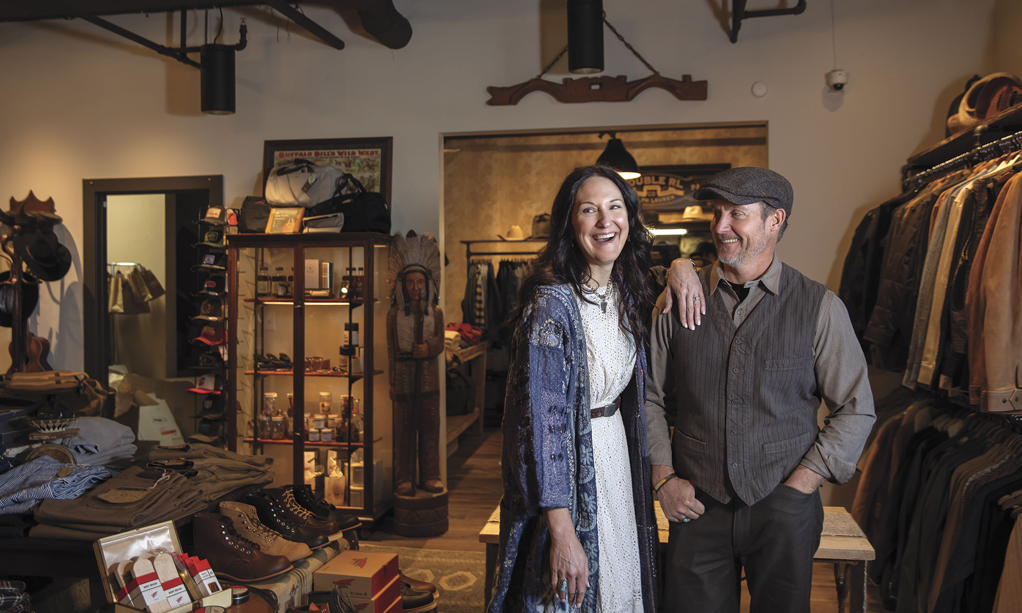 The Burches in their Phoenix men’s boutique, Cave + Post Trading Co. Mary wears a Magnolia Pearl dress and duster; Patrick wears Freenote Cloth duster pants and Double RL by Ralph Lauren shirt and vest. The Burches in their Phoenix men’s boutique, Cave + Post Trading Co. Mary wears a Magnolia Pearl dress and duster; Patrick wears Freenote Cloth duster pants and Double RL by Ralph Lauren shirt and vest.