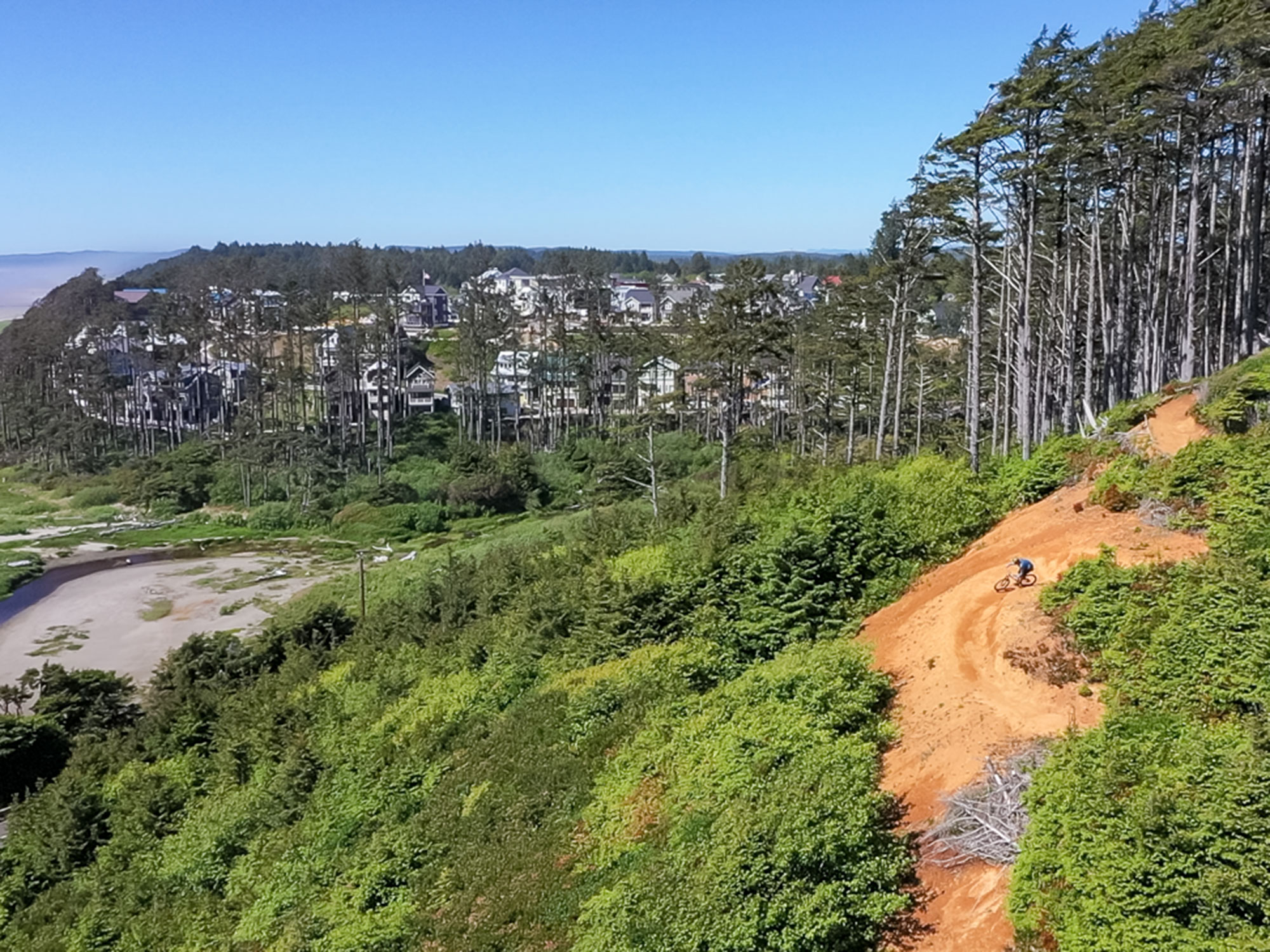 https://www.phoenixmag.com/wp-content/uploads/2024/03/Mountain-Bike-trails-at-Seabrook-WA.jpg