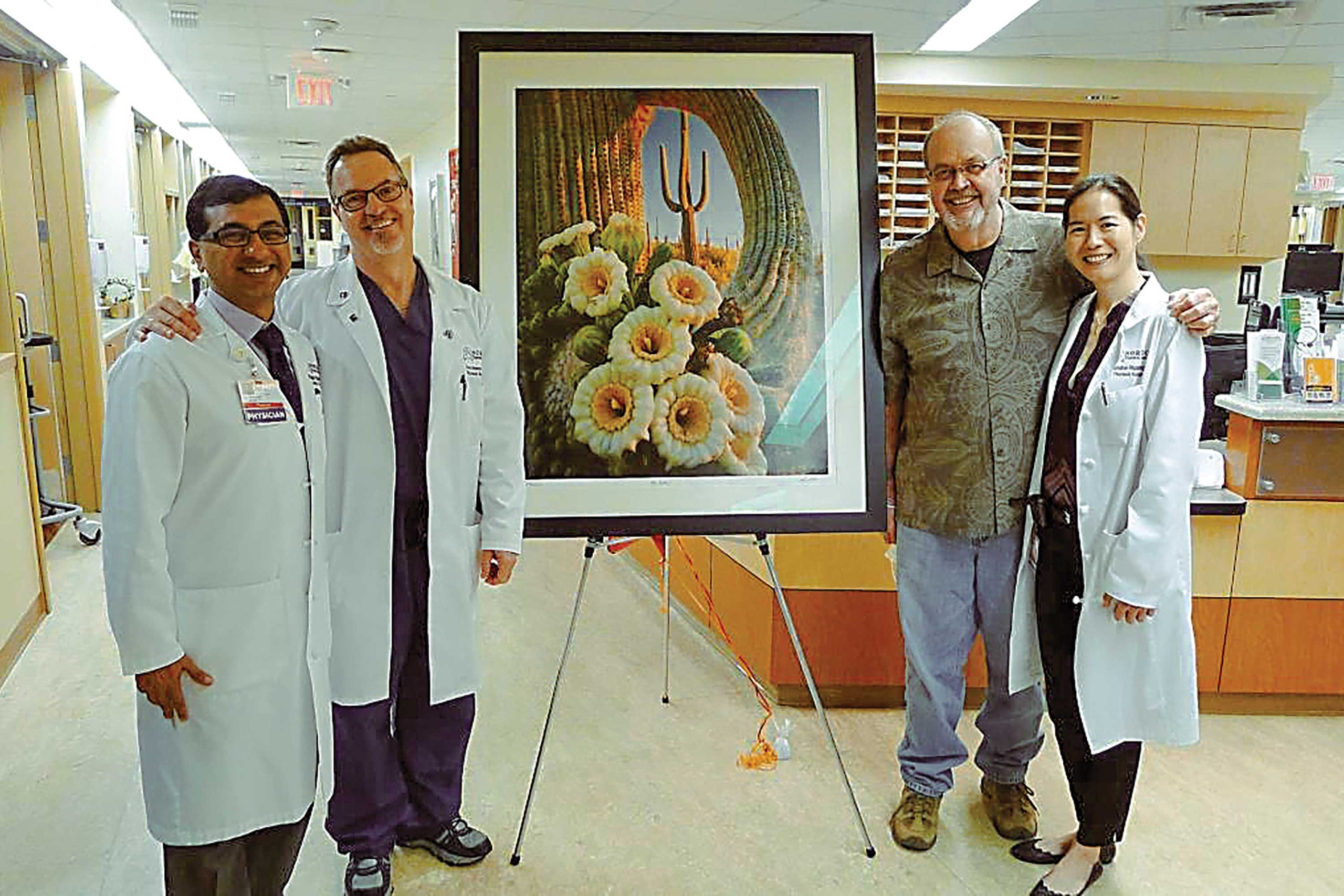 Photographer Jack Dykinga gifted his surgical team, Drs. Walia, Bremner and Huang (left to right), with a framed photo after his successful lung transplant. Photographer Jack Dykinga gifted his surgical team, Drs. Walia, Bremner and Huang (left to right), with a framed photo after his successful lung transplant.