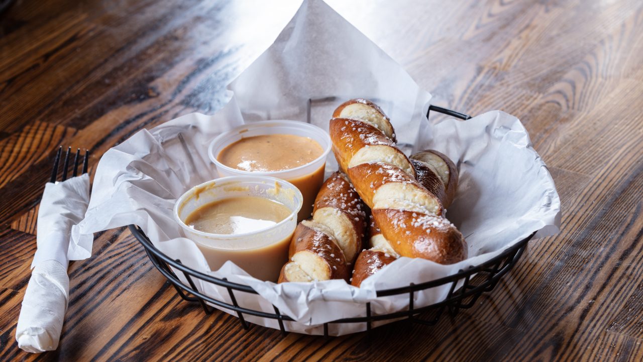 https://www.phoenixmag.com/wp-content/uploads/2024/04/Barrio-Brewing-Pretzel-Basket-1280x720.jpg