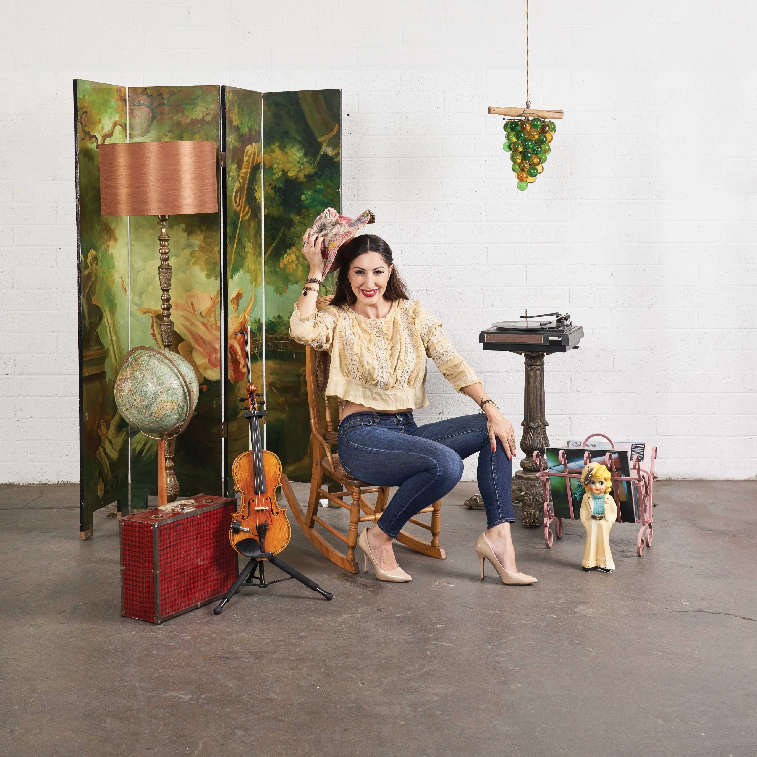 Best One-Woman Band Selin Eskandarian (pg. 195) dons a hat and top from Purple Lizard in a set of curated wares from Camelback Antiques. Photo by Camerawerks Best One-Woman Band Selin Eskandarian (pg. 195) dons a hat and top from Purple Lizard in a set of curated wares from Camelback Antiques. Photo by Camerawerks