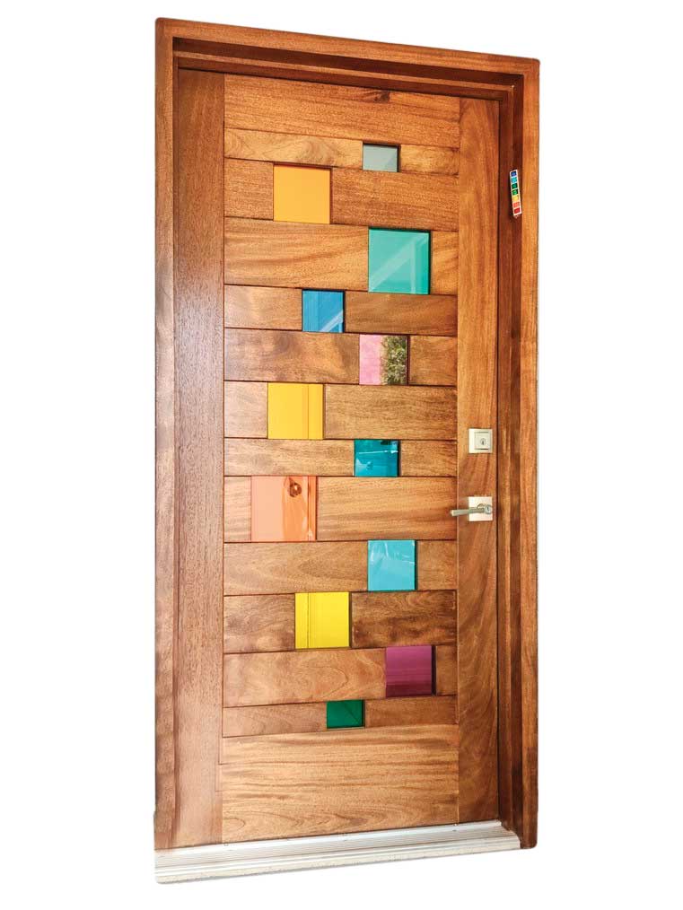 The artist designed this colorful front door for his own house, choosing solid mahogany for its color, stability and grain. The artist designed this colorful front door for his own house, choosing solid mahogany for its color, stability and grain.
