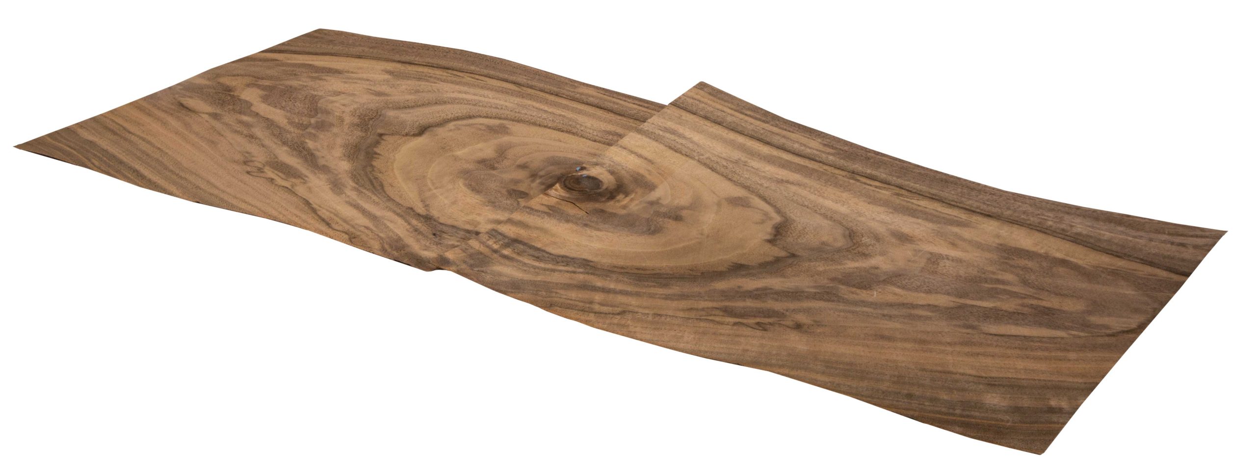He uses 1/42-inch commercial-grade wood veneer to create “book-matched” panels on adjoining surfaces for a continuous look that can’t be achieved with solid woods. He uses 1/42-inch commercial-grade wood veneer to create “book-matched” panels on adjoining surfaces for a continuous look that can’t be achieved with solid woods.