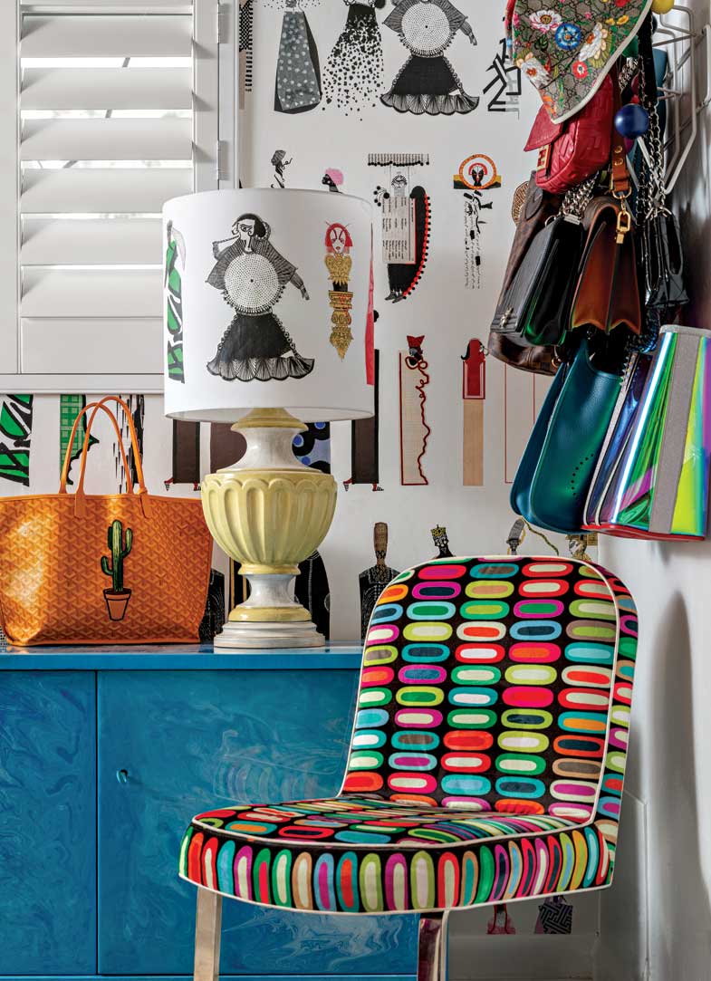 In her office/closet, Buckingham’s love of fashion inspires her design work. Her favorite bags and purses mingle with the furnishings and finishes in a tangle of good taste. In her office/closet, Buckingham’s love of fashion inspires her design work. Her favorite bags and purses mingle with the furnishings and finishes in a tangle of good taste.