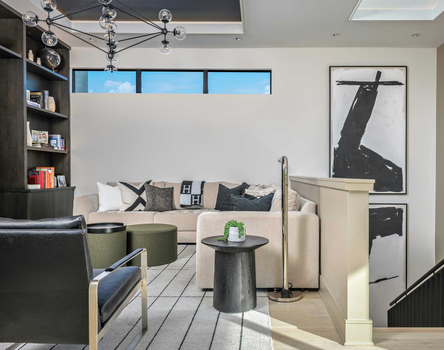 The top floor is as light and airy as the downstairs, its surfaces and palette matching those of the lower level. Darren spends most of the day upstairs with his nanny, in a sprawling entertainment room filled with toys and games, far enough away from Shawn’s downstairs office so that Dad can work in peace. The top floor is as light and airy as the downstairs, its surfaces and palette matching those of the lower level. Darren spends most of the day upstairs with his nanny, in a sprawling entertainment room filled with toys and games, far enough away from Shawn’s downstairs office so that Dad can work in peace.