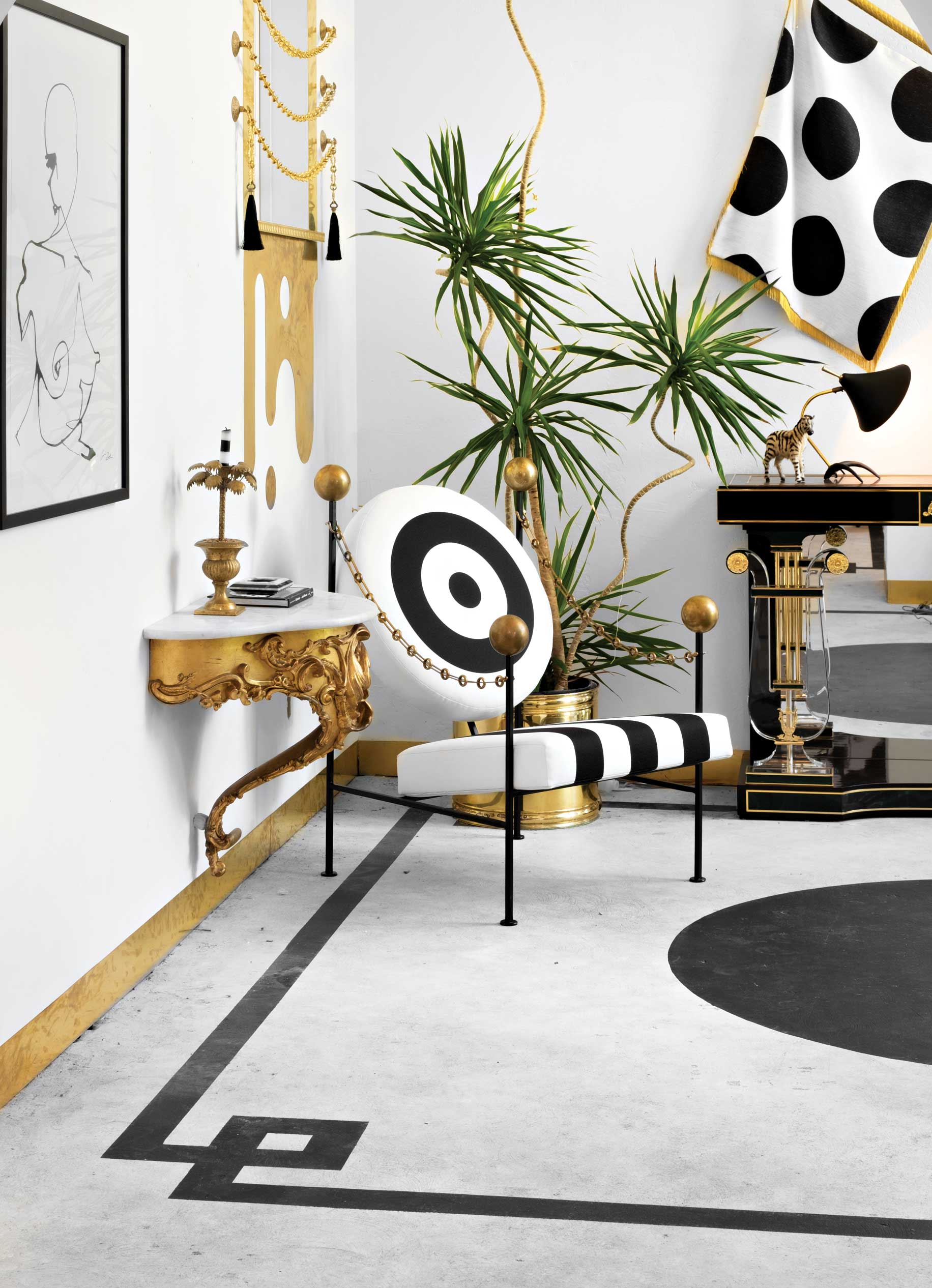 McDermott’s Target Practice chair sits companionably by a 19th-century Rococo marble-topped side table in the den. McDermott’s Target Practice chair sits companionably by a 19th-century Rococo marble-topped side table in the den.