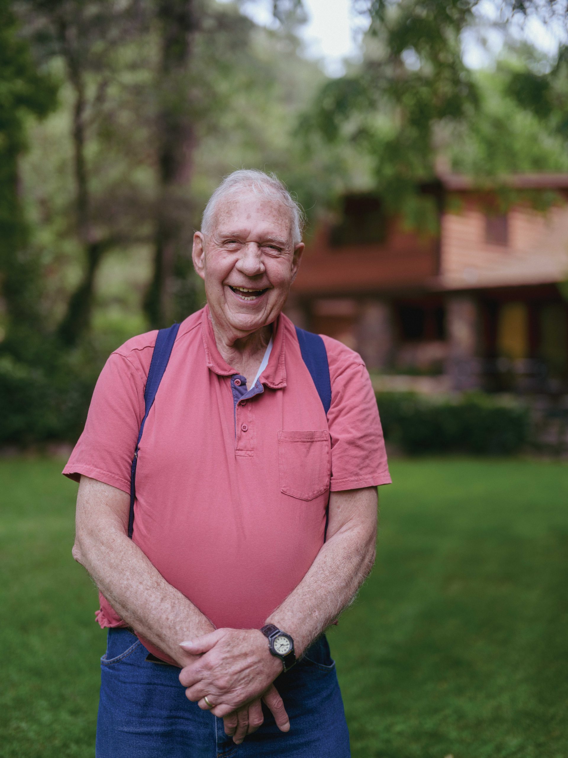 the junior Bob Kittredge in front of the writer's cabin in Oak Creek