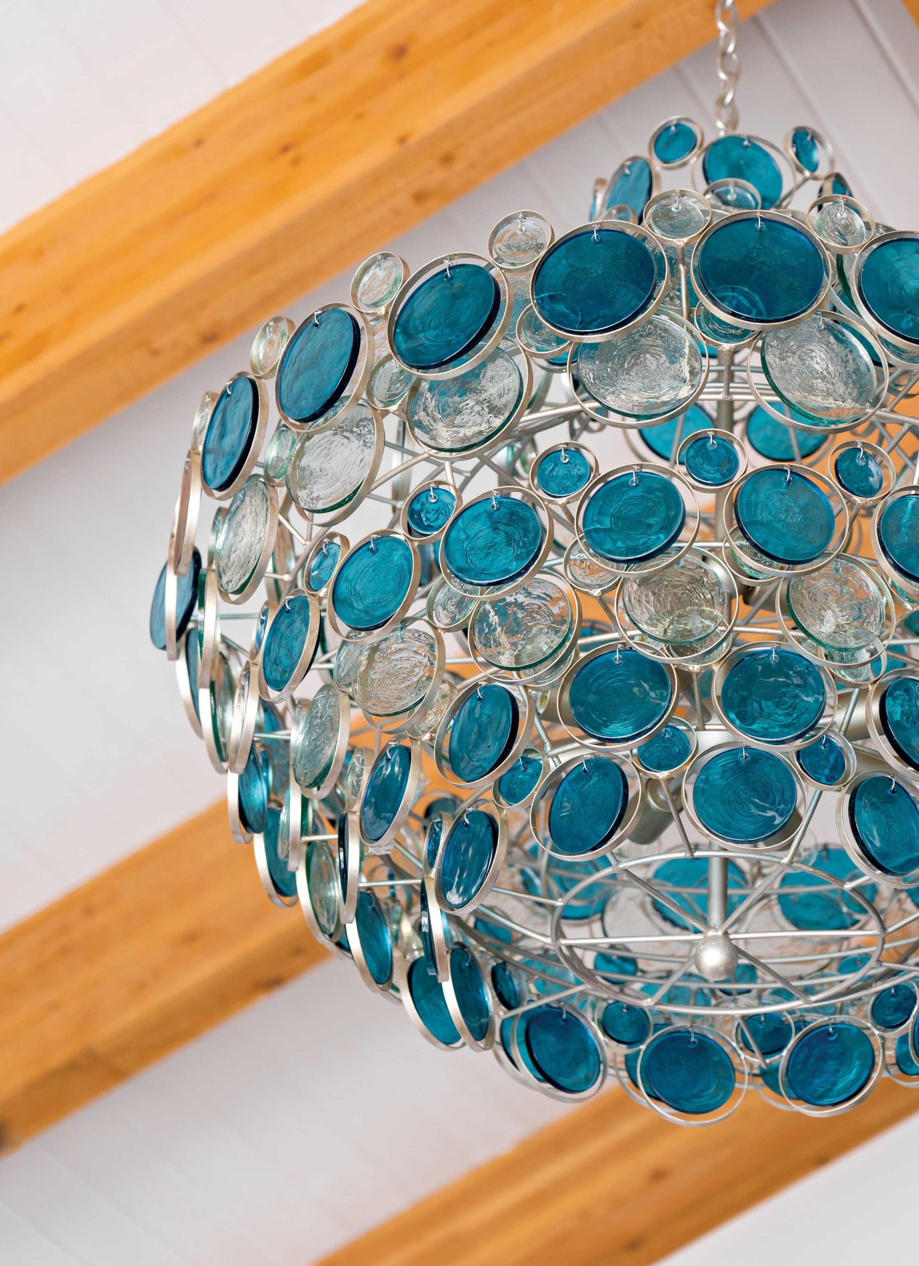 A handblown glass pendant in the great room helped set the colorful tone for an interior update. A handblown glass pendant in the great room helped set the colorful tone for an interior update.