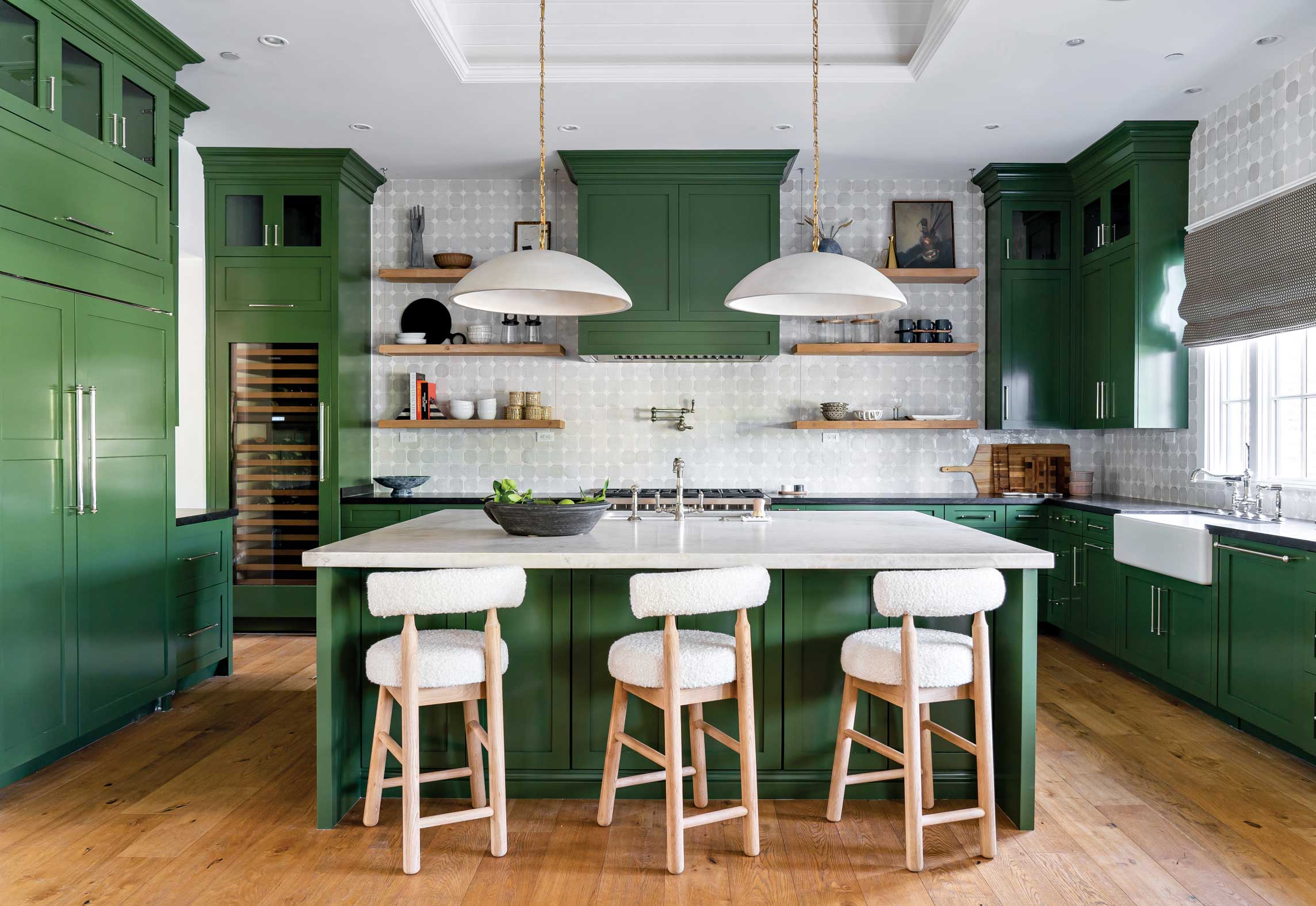 The kitchen’s major changes were new countertops and lighting, as well as painting the previously white cabinetry a fresh shade of green. The kitchen’s major changes were new countertops and lighting, as well as painting the previously white cabinetry a fresh shade of green.
