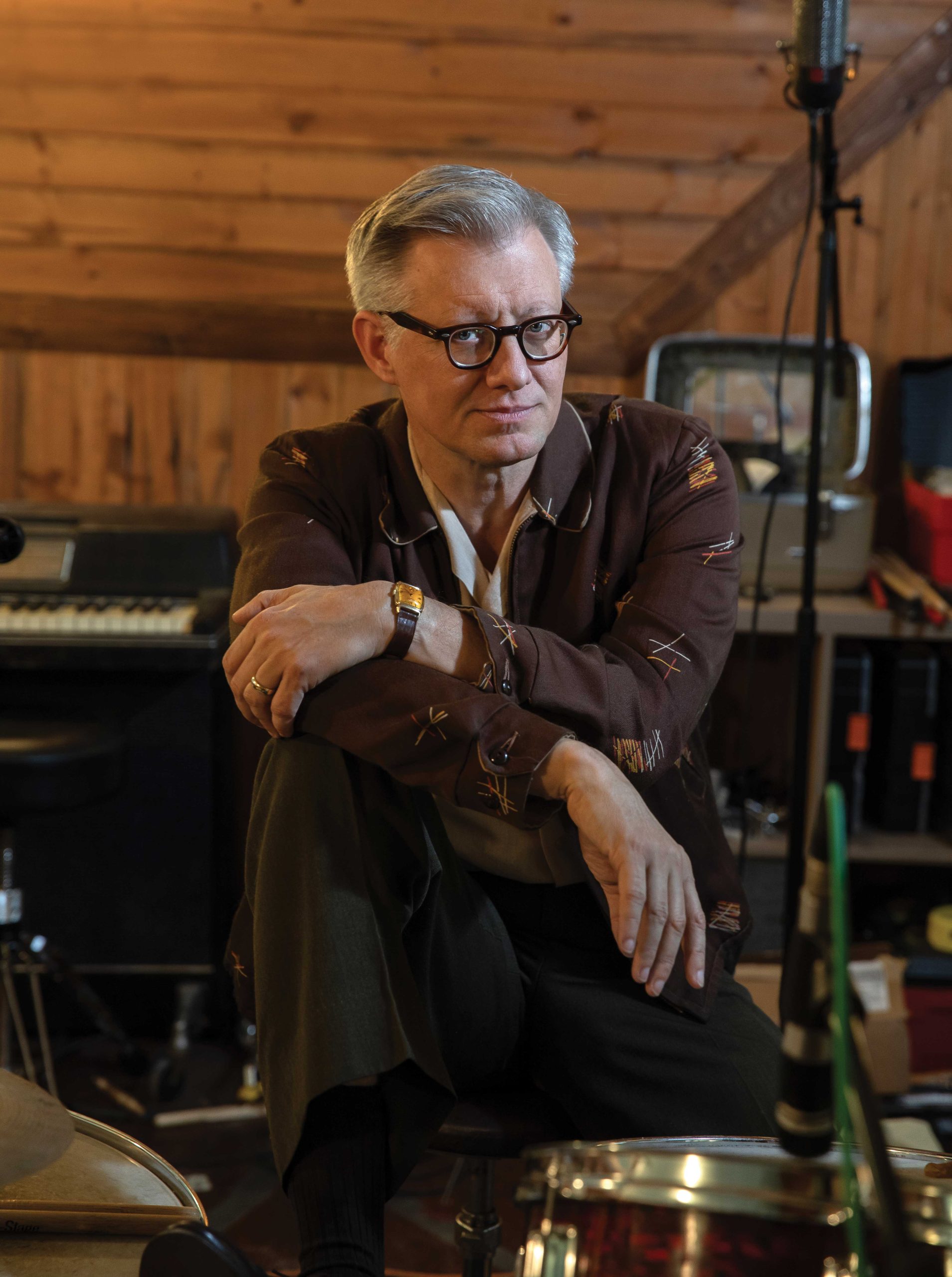 At his Mesa recording studio, Hoag wears: 1950s reversible gabardine jacket; Korean War-era USMC dress pants; 1950s Penney’s Towncraft shirt; 1950s Florsheim shoes; 1945 Gruen Veri-Thin watch; 1950s StylRite Optical glasses