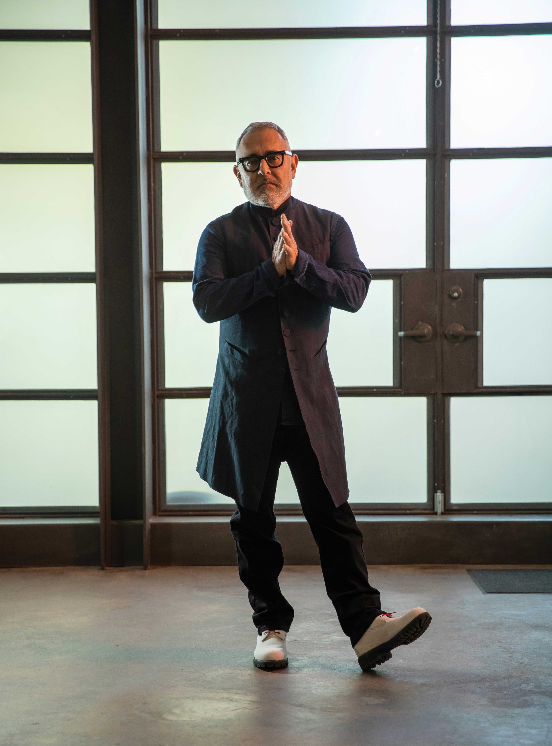 At his Phoenix art gallery, Reyes wears: Jean Paul Gaultier jacket; Patania bracelet; Levi’s pants; Timberland boots