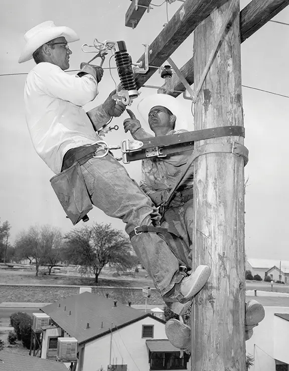 lineworker in 1950s. Photos Courtesy APS; by Mirelle Inglefield lineworker in 1950s. Photos Courtesy APS; by Mirelle Inglefield