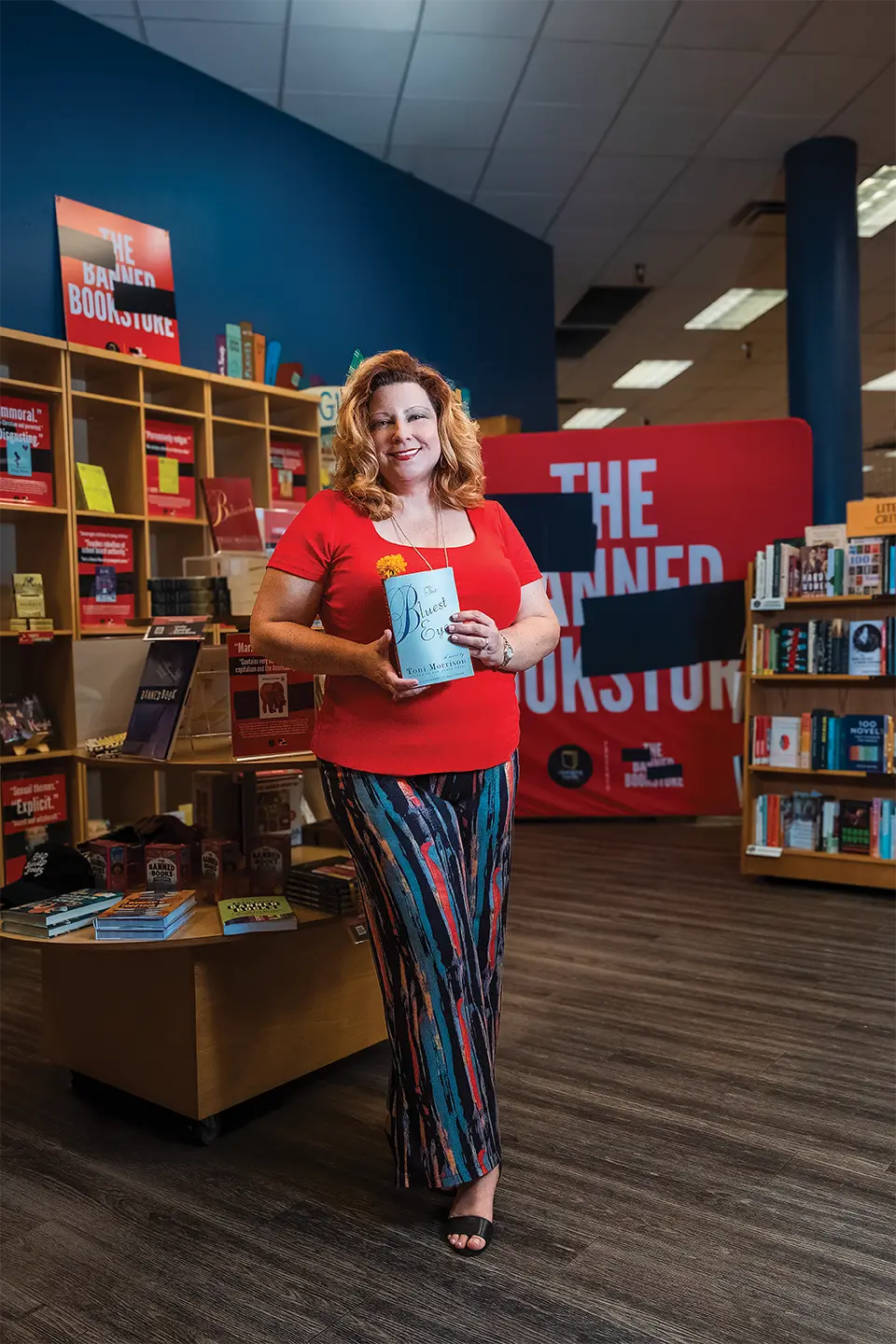 Fairall with Toni Morrison’s oft-banned Depression-era novel The Bluest Eye in “The Banned Bookstore” section at Changing Hands in Tempe. Photo by Mirelle Inglefield Fairall with Toni Morrison’s oft-banned Depression-era novel The Bluest Eye in “The Banned Bookstore” section at Changing Hands in Tempe. Photo by Mirelle Inglefield