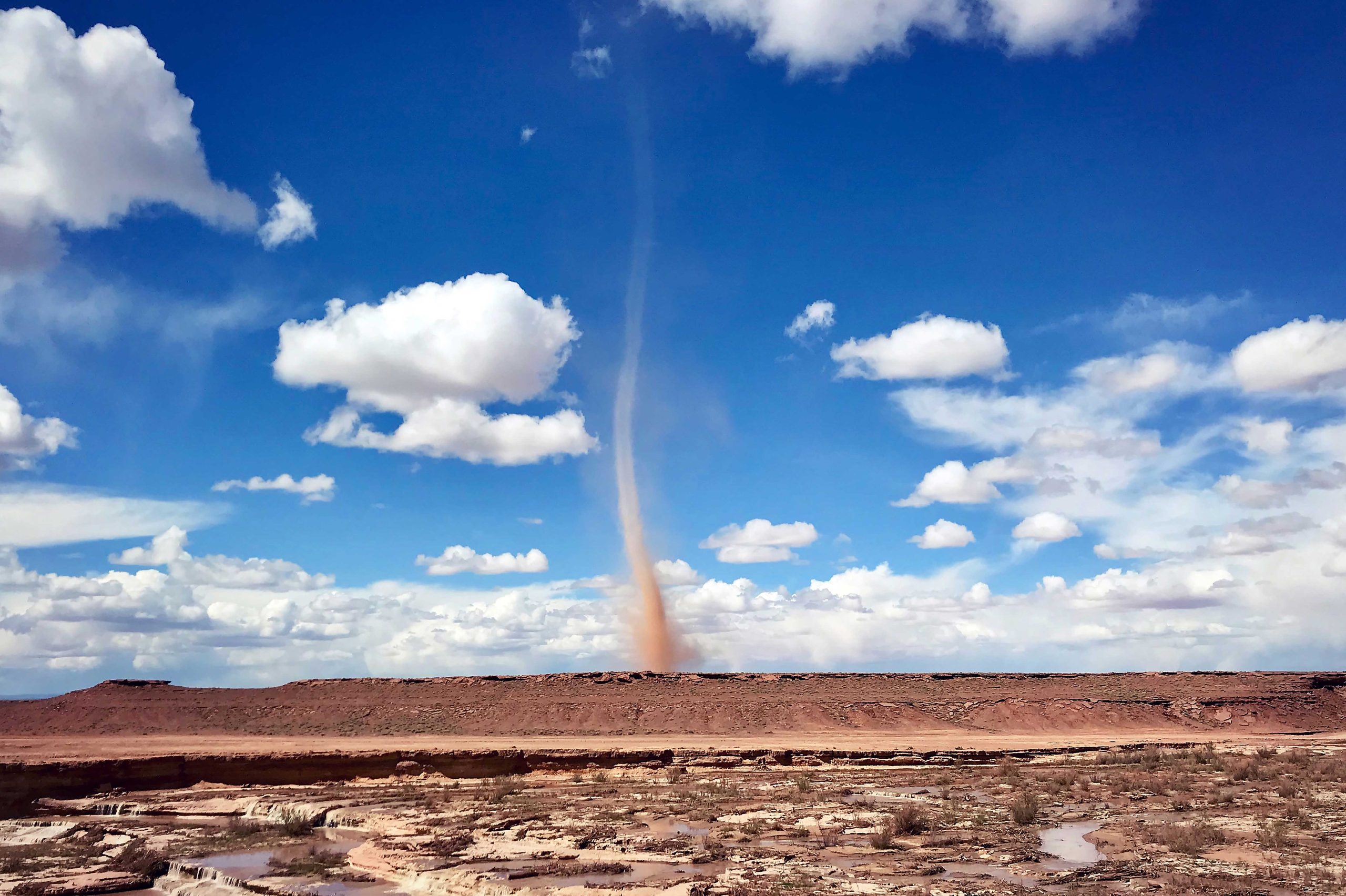 Dust-Devil-at-Grand-Falls-in-Northern-Arizona https://www.phoenixmag.com/wp-content/uploads/2025/08/Dust-Devil-at-Grand-Falls-in-Northern-Arizona-scaled.jpg