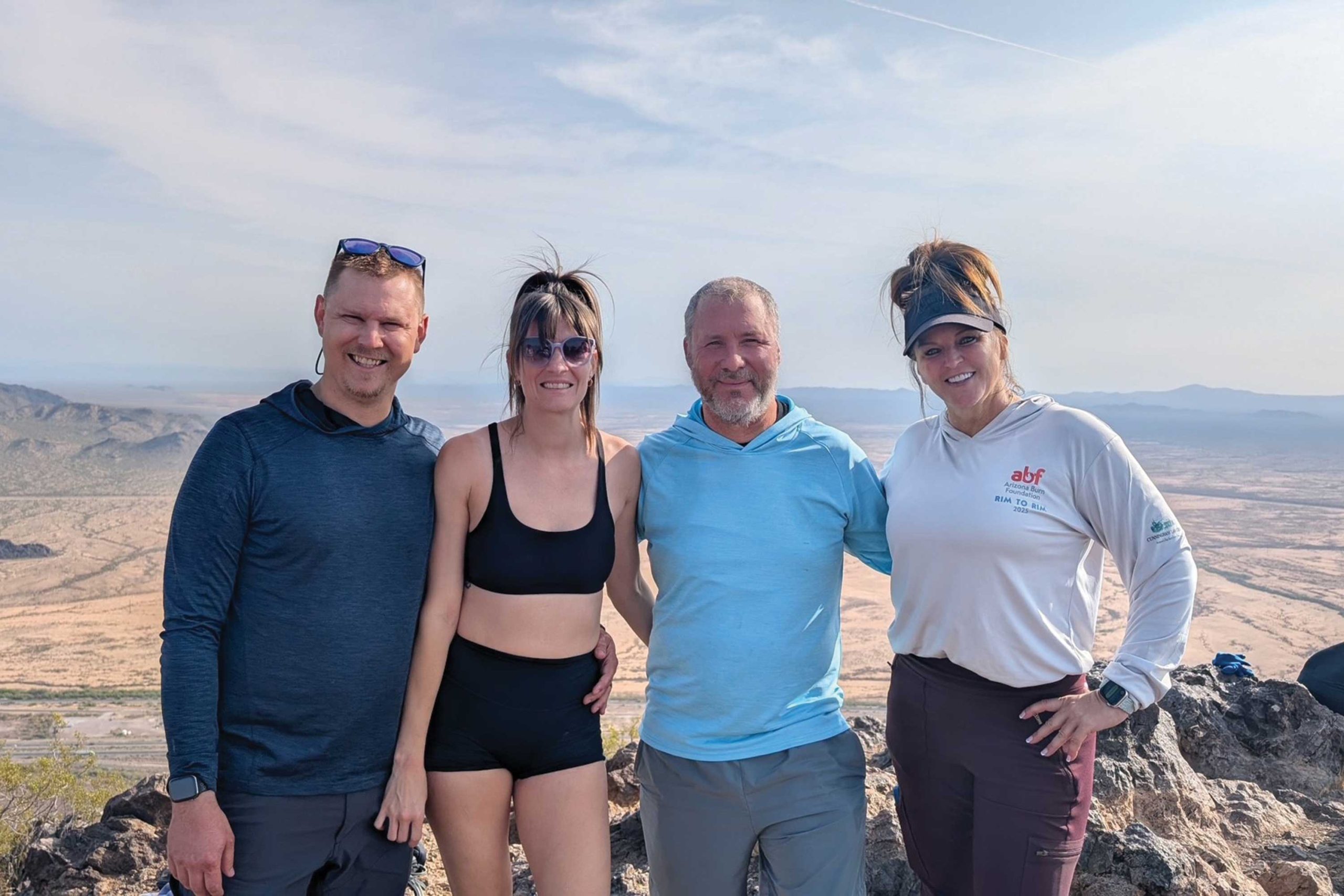 Parker and Sierra Mildebrandt, Jason Nelson and Tami Chmielewski on a training hike Parker and Sierra Mildebrandt, Jason Nelson and Tami Chmielewski on a training hike