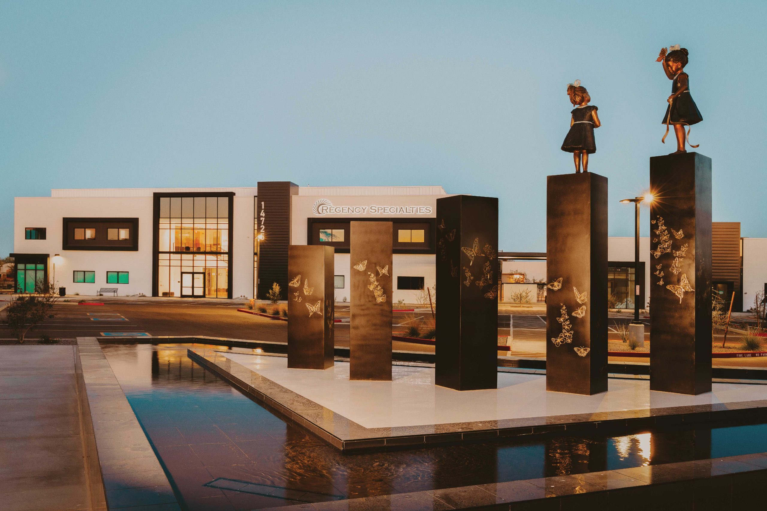 Regency’s main campus in Surprise features likenesses of Mussman’s daughters, Auvianna and Iyla, playing atop the courtyard fountain Regency’s main campus in Surprise features likenesses of Mussman’s daughters, Auvianna and Iyla, playing atop the courtyard fountain