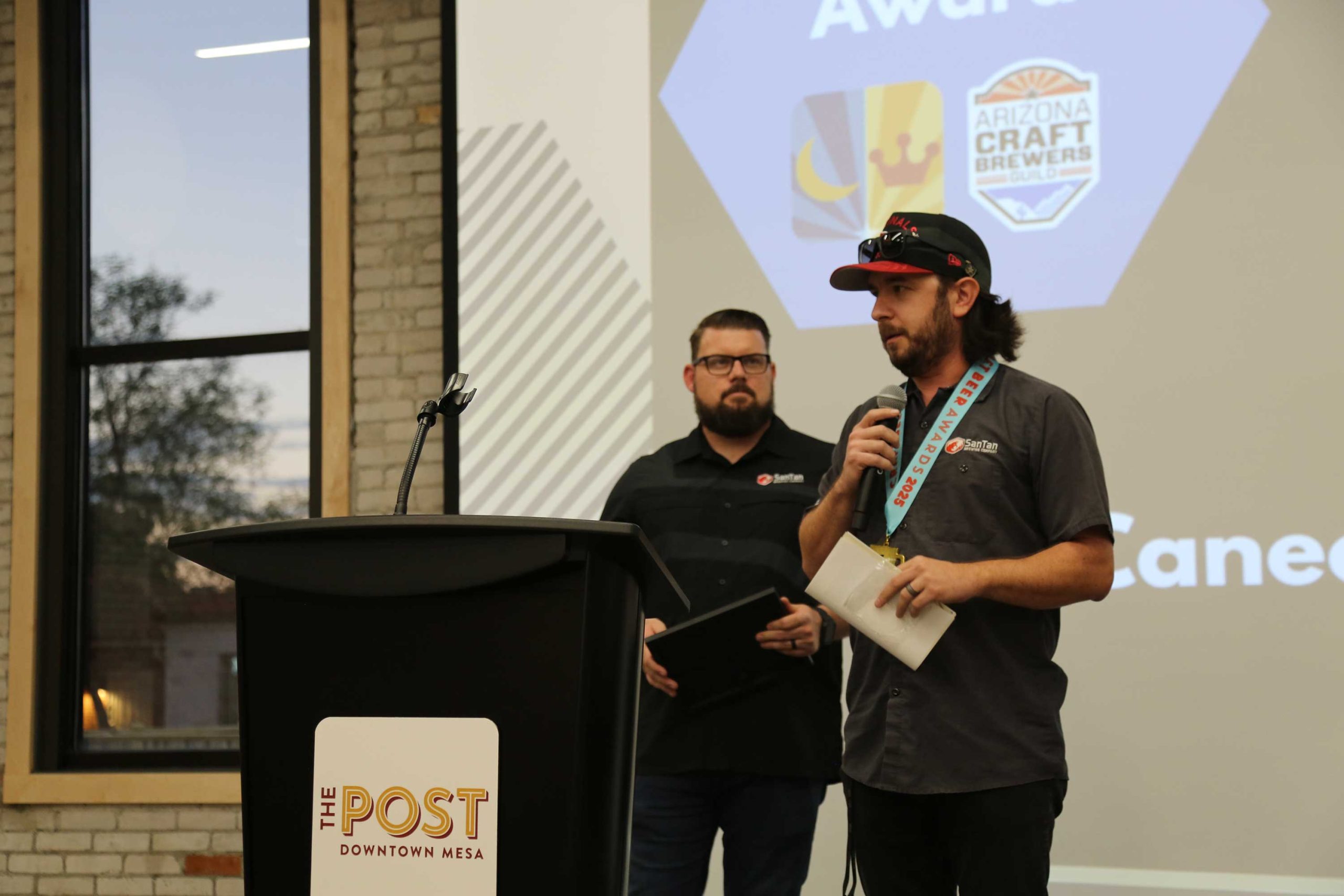 SanTan's Alejandro Fontes accepts the Arizona Craft Brewer's Guild Director's Award on behalf of SanTan's late founder Anthony Canecchia