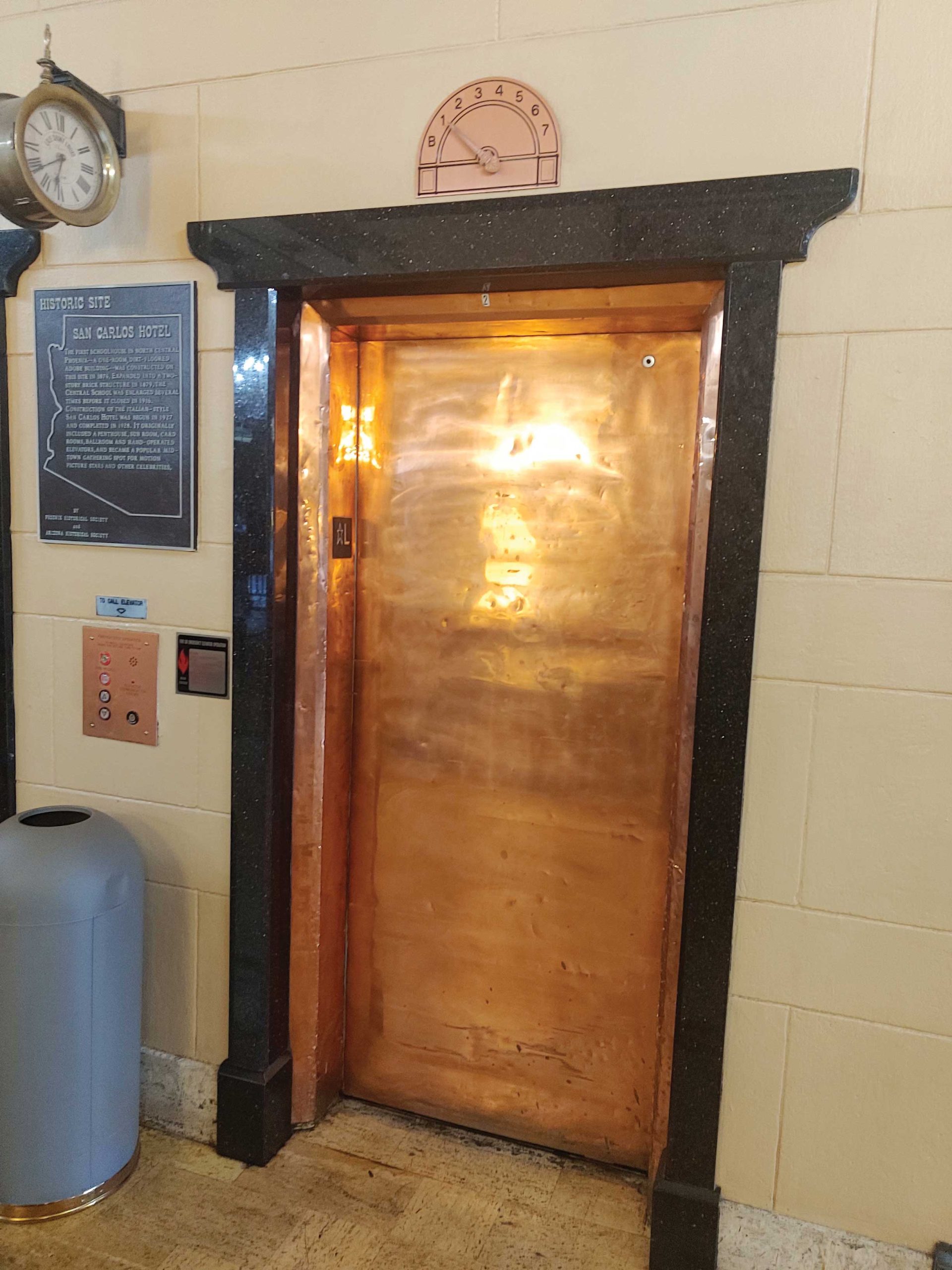 the hotel's original copper-sheathed elevator doors the hotel's original copper-sheathed elevator doors