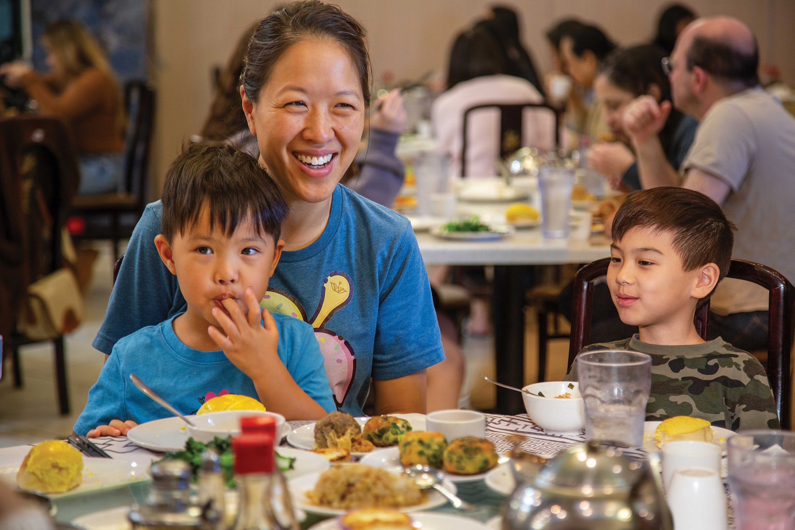 Sweet Republic owner Helen Yung with her kids, Edison (left) and Harrison (right), at Mekong Palace dim sum Sweet Republic owner Helen Yung with her kids, Edison (left) and Harrison (right), at Mekong Palace dim sum