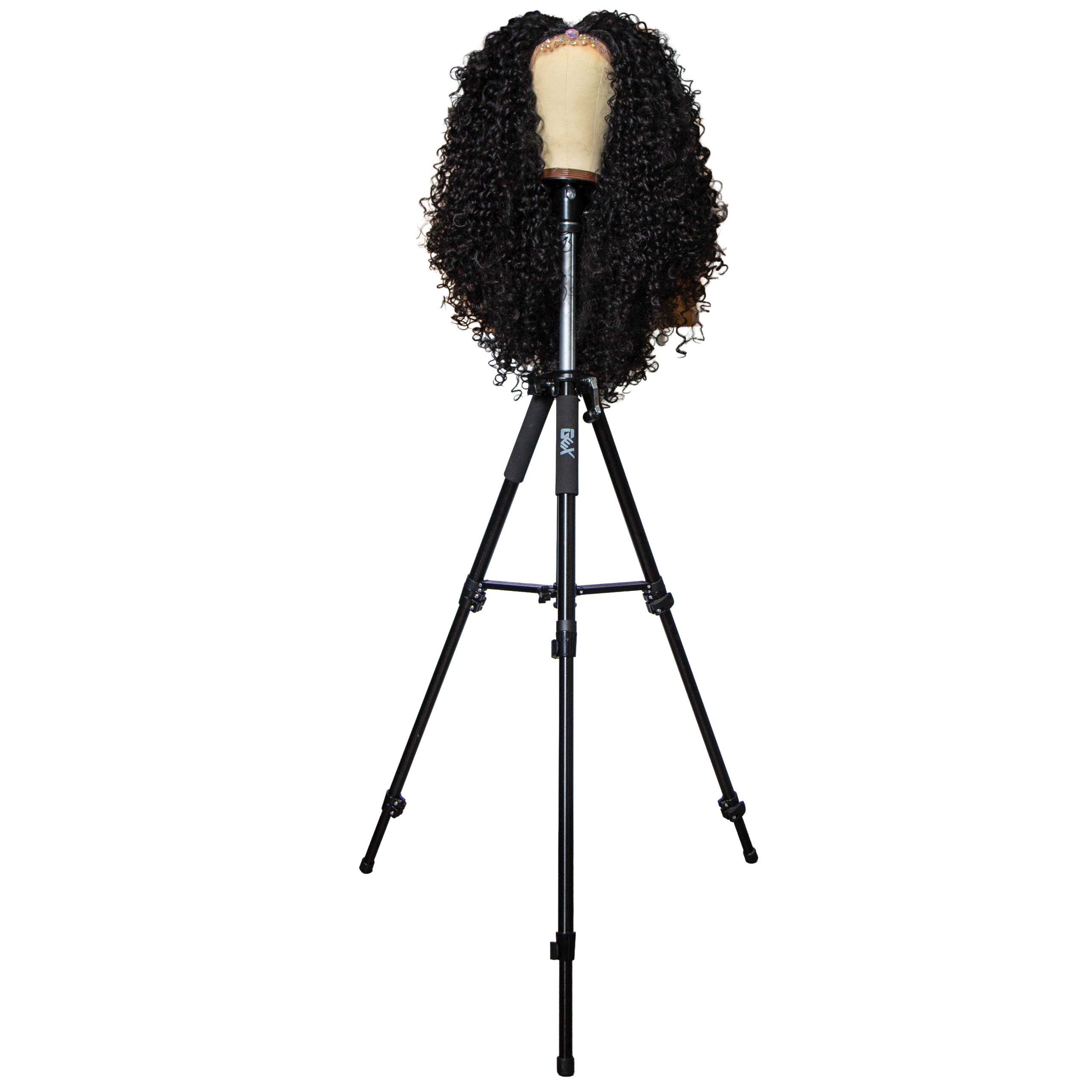 Cher Wig & Wig Stand “Sometimes I need to be able to look down on a scalp when I design. This looks like a camera tripod, but it’s actually designed for wigs.”