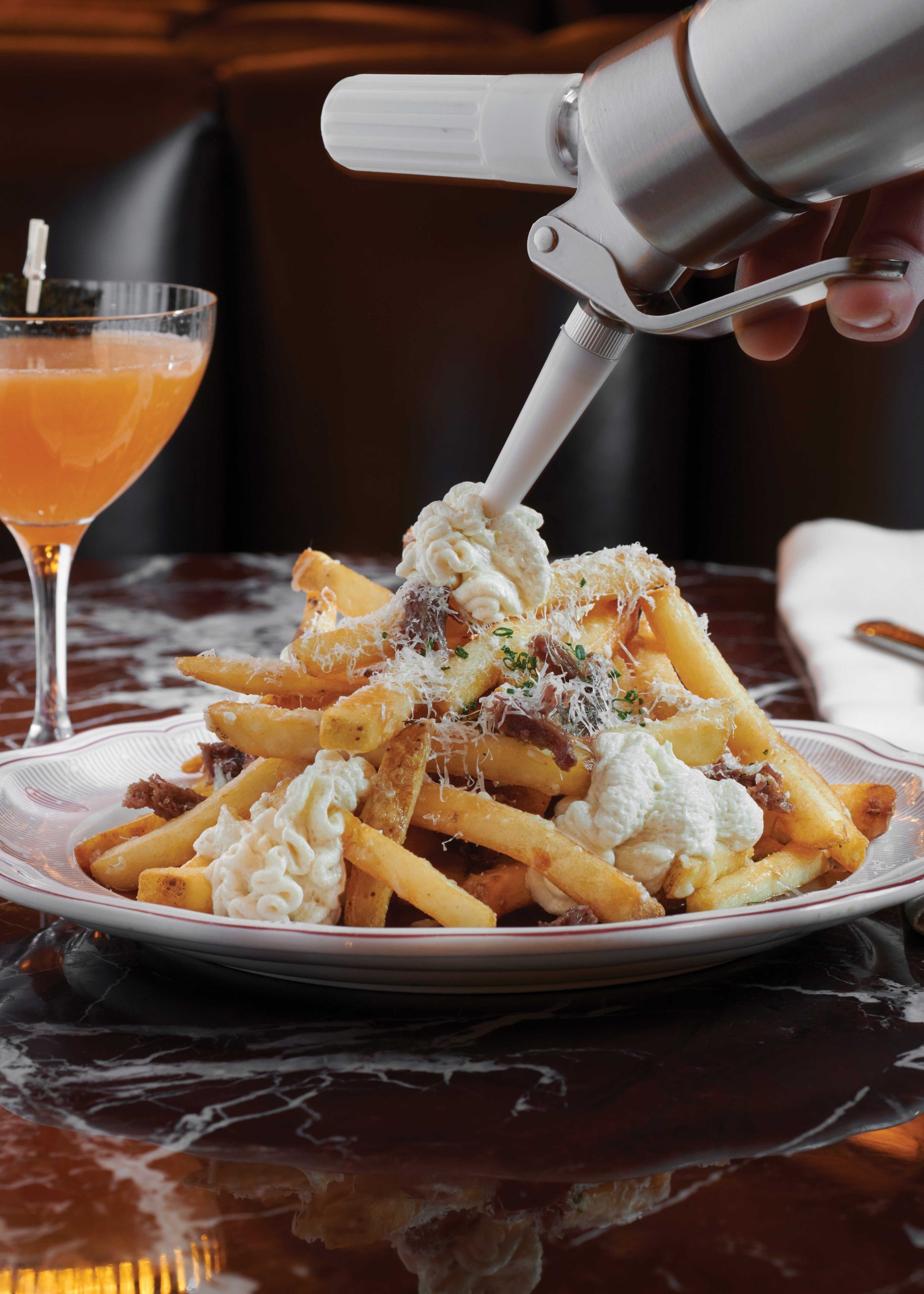 Duck fries paired with the Mischief in a Glass Duck fries paired with the Mischief in a Glass