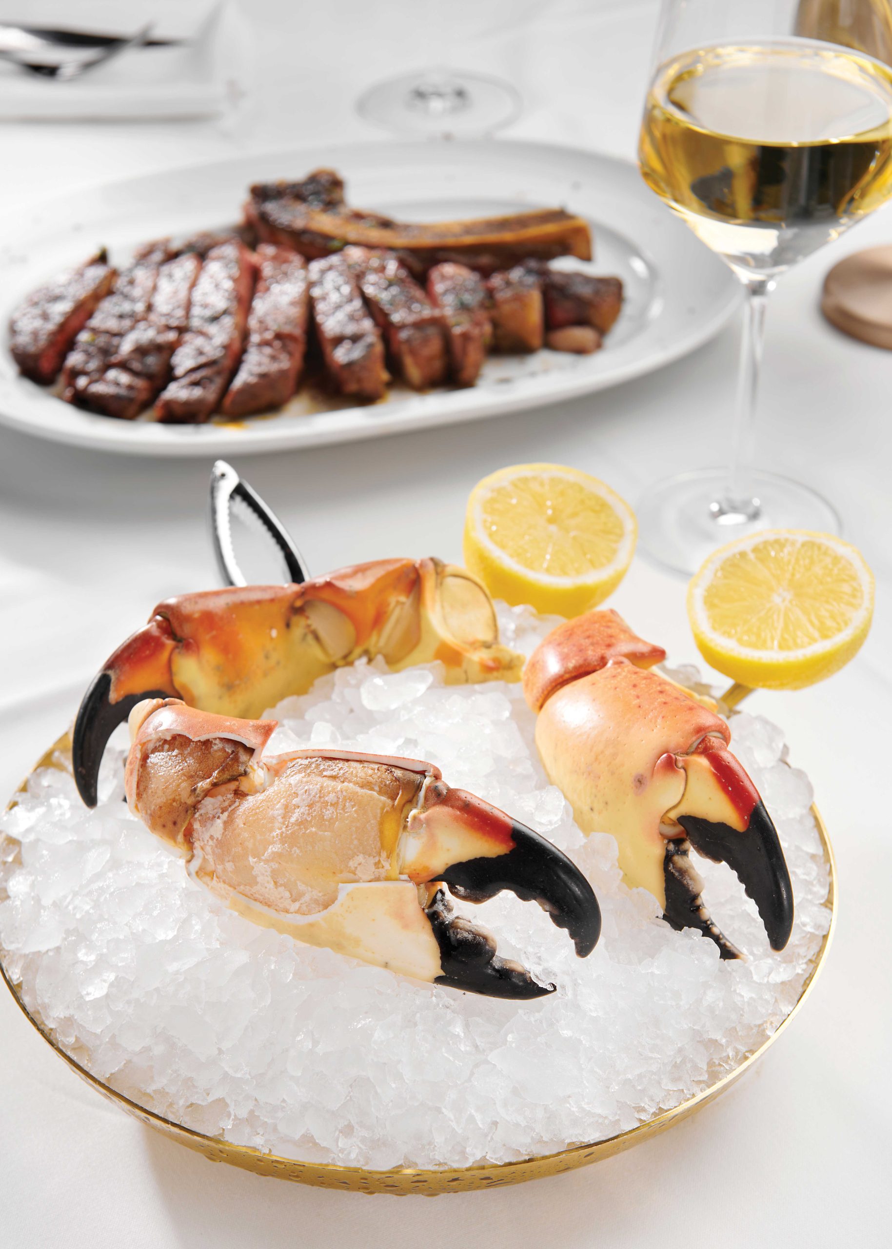 Stone crab claw with rib eye at Durant’s Stone crab claw with rib eye at Durant’s
