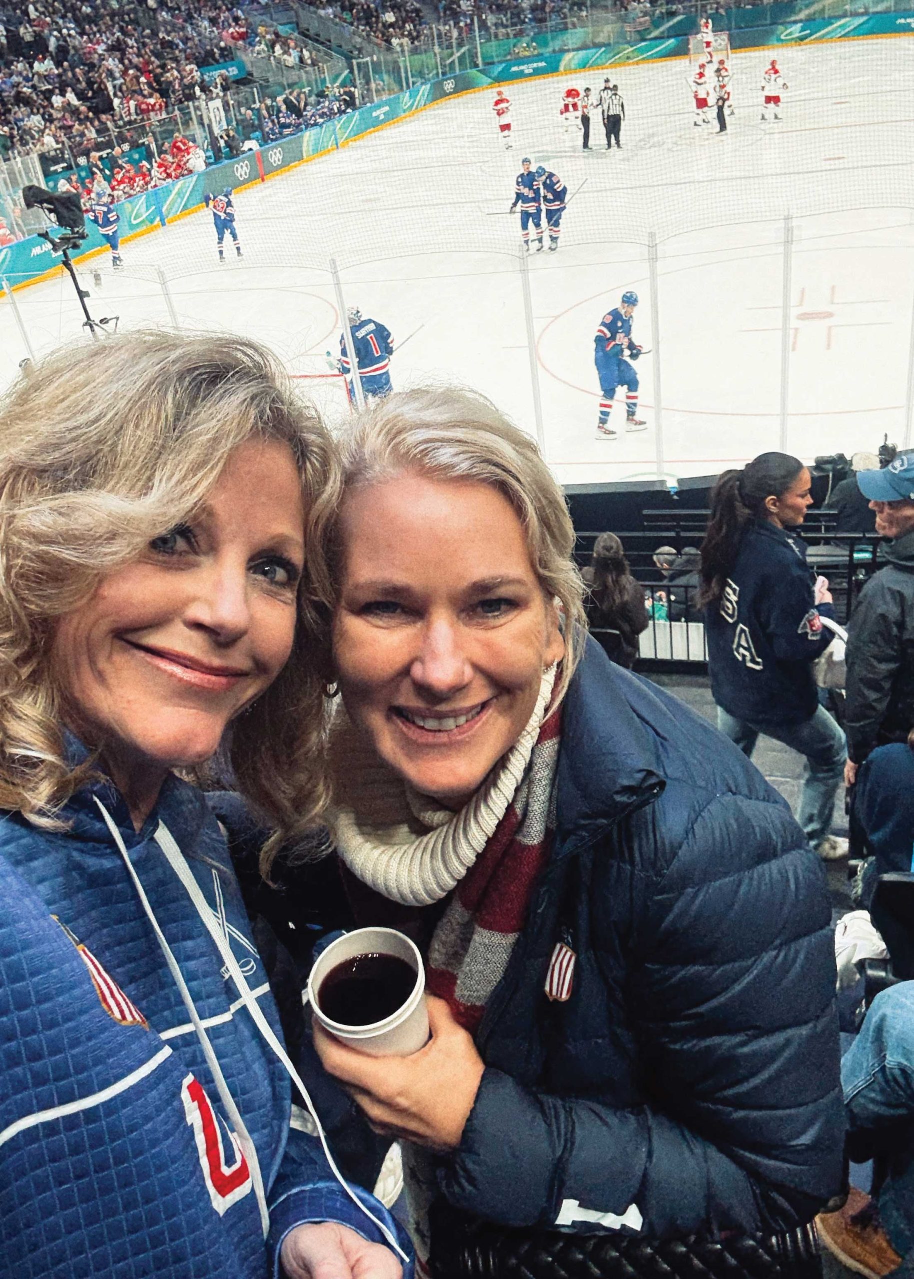 Tara Hitchcock (left) and Chantal Tkachuk at a preliminary Team USA hockey game