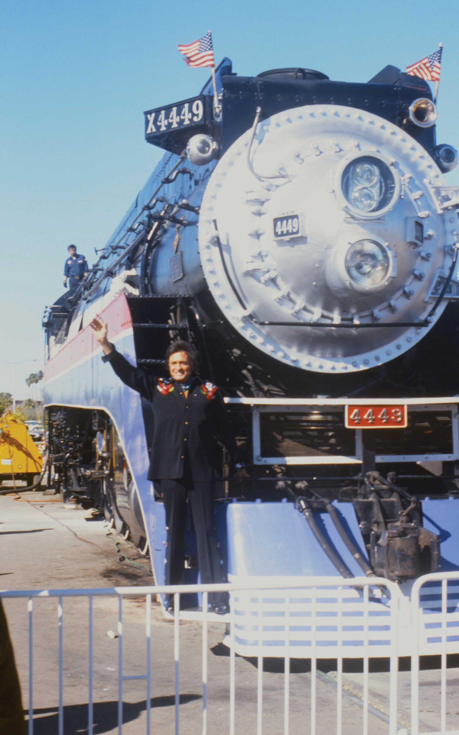 Music superstar Johnny Cash waves to the crowd from the American Freedom Train in 1976 Music superstar Johnny Cash waves to the crowd from the American Freedom Train in 1976